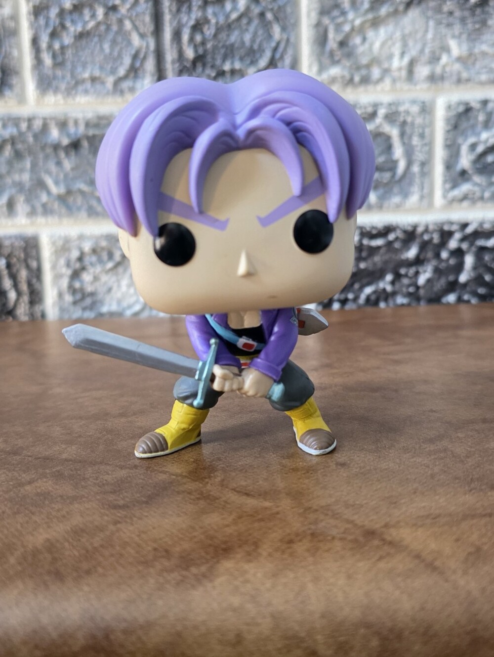 Funko Pop! Purple-Haired Warrior Figure with Sword and Yellow Boots